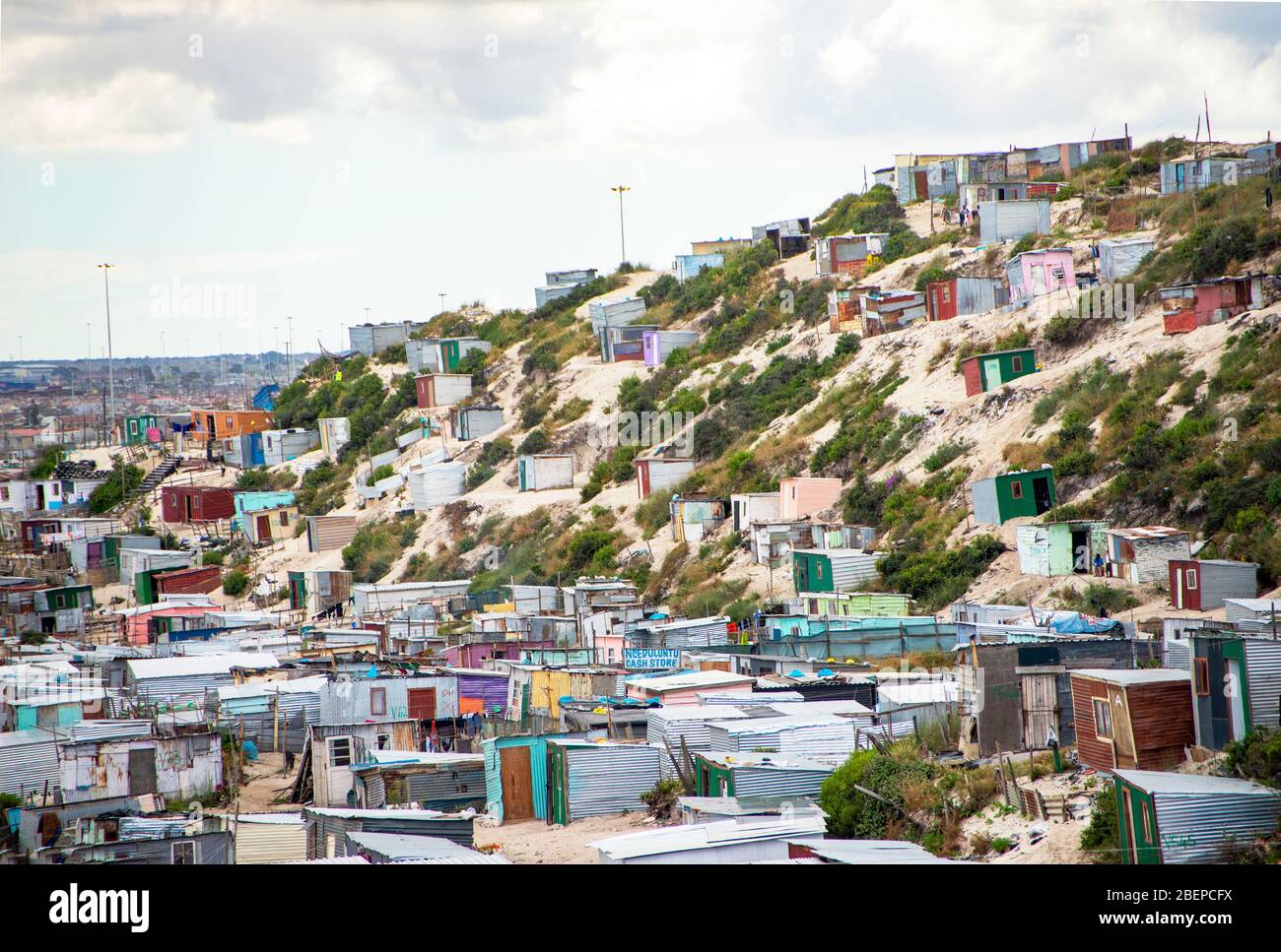 A view of the township called Khayelitsha on the outskirts of Cape Town,  South Africa. The shacks sit on sandy soil and hillsides. It is one of the  biggest townships in Africa