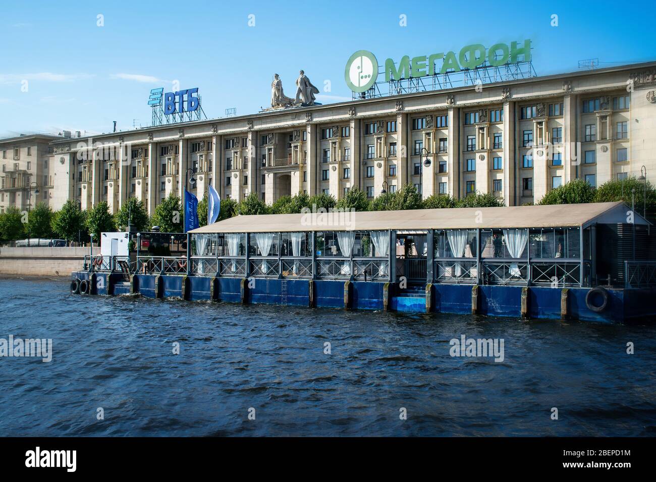 St. Petersburg, Russia, summer 2019: Petrovskaya Embankment, a floating restaurant on the Neva River Stock Photo