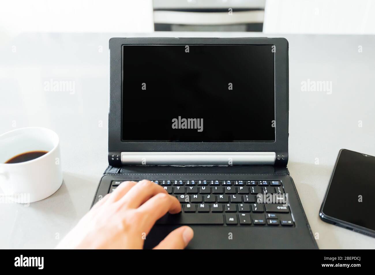 Work table at home with a tablet and a mobile phone Stock Photo Alamy