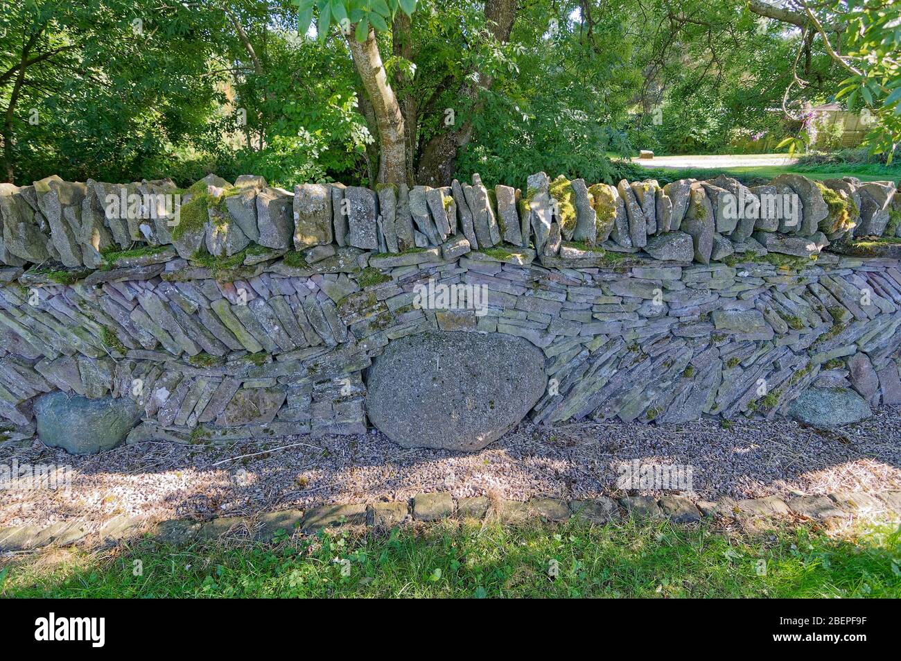 A decorative Dry Stone wall on the edge of the Murton Lochs Nature Reserve on the outskirts of Forfar. Stock Photo