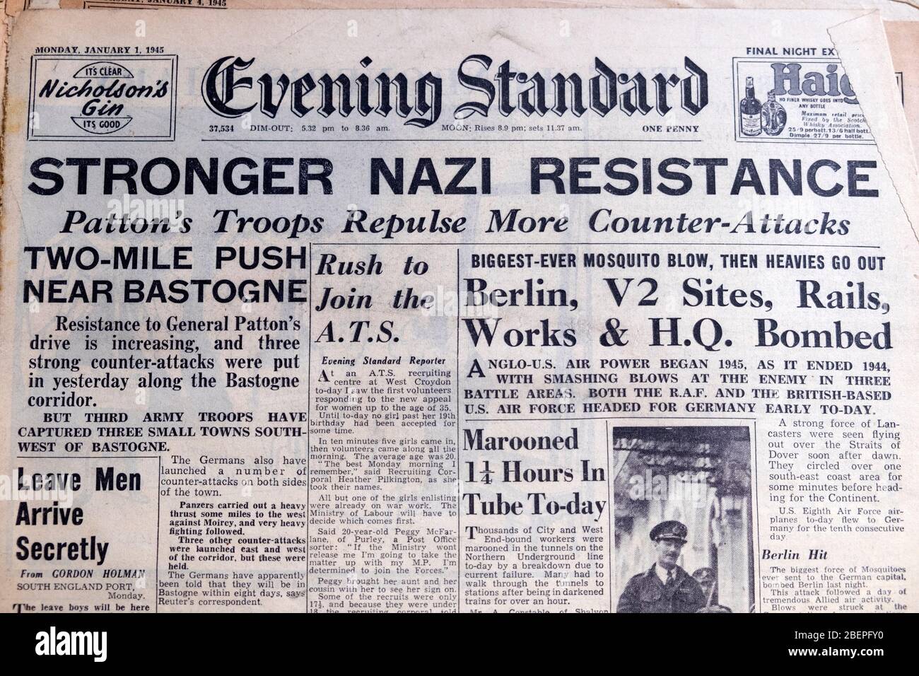 WWII British vintage newspaper headline on 1 January 1945  'Stronger Nazi Resistance'  'General Patton Two Mile Push near Bastogne' London England UK Stock Photo