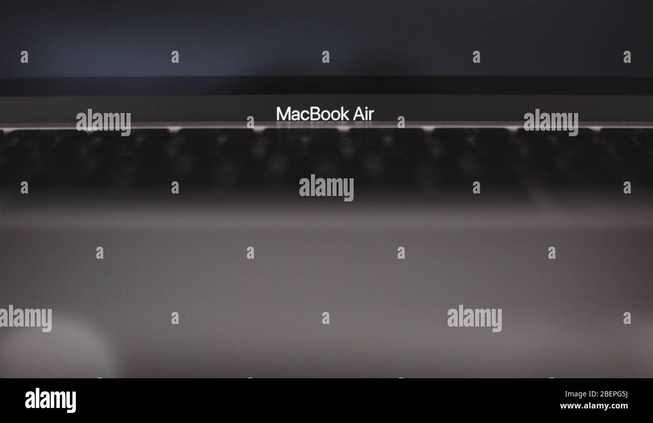 Macro close-up of the logo above the keyboard on the brand new 13' 2020 MacBook Air by Apple Stock Photo