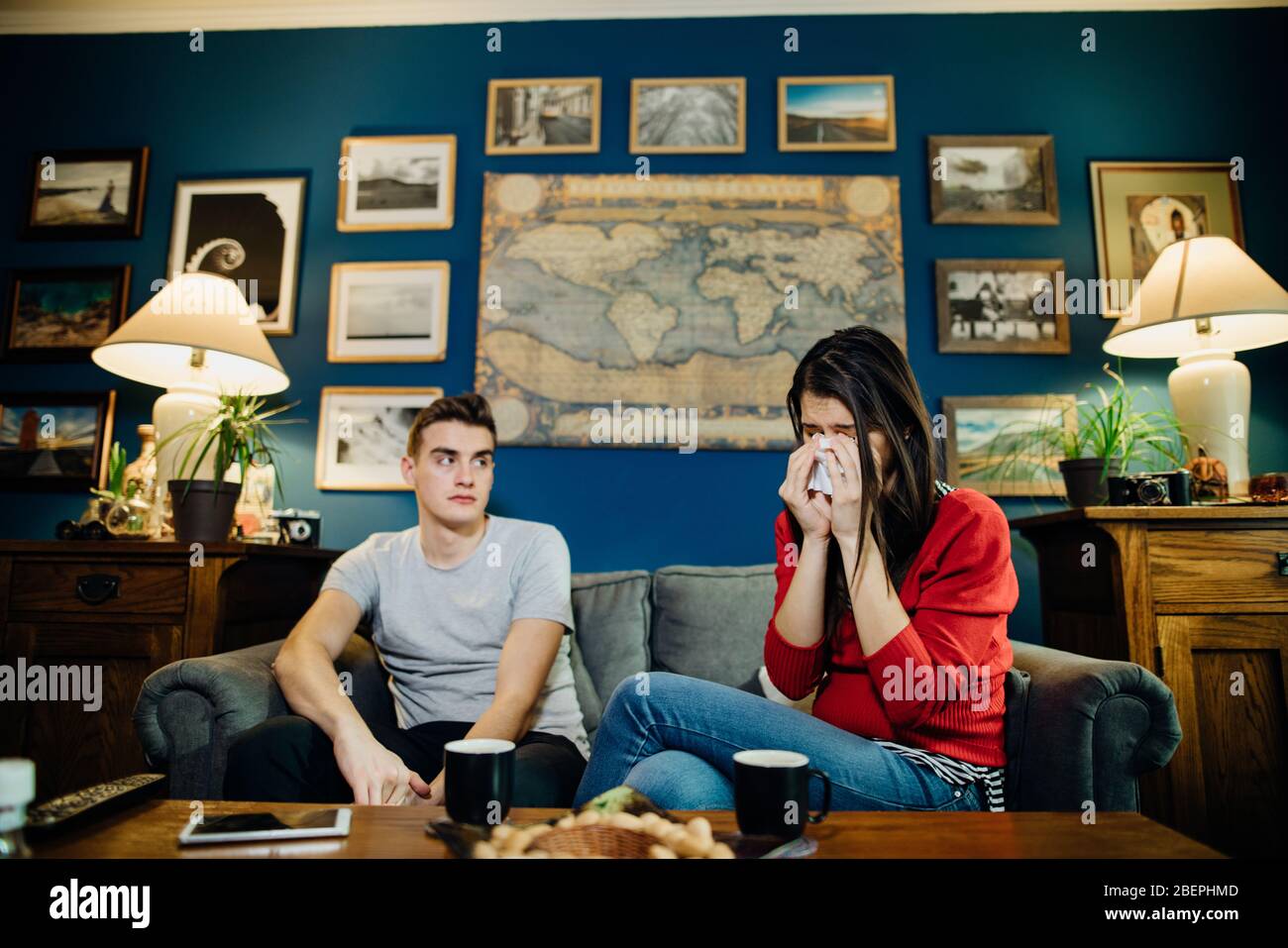 Stressed couple having financial problems.Bankruptcy.Loosing property.Relationship disagreements,divorce,break up.Handling bad news.Overreaction,annoy Stock Photo