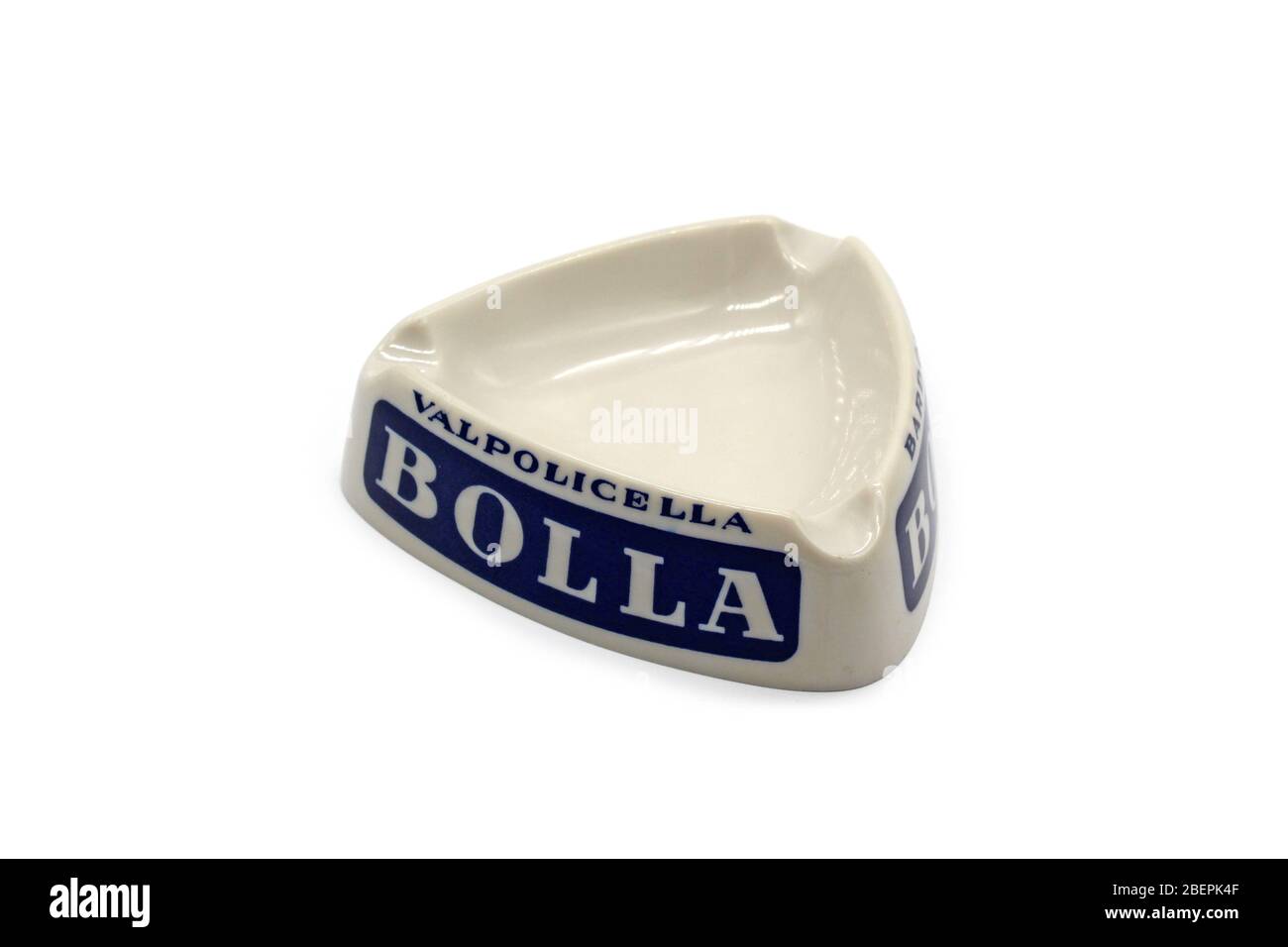Vintage porcelain ashtray with logo of Bolla Valpolicella italian wine, isolated on a white background, close up Stock Photo
