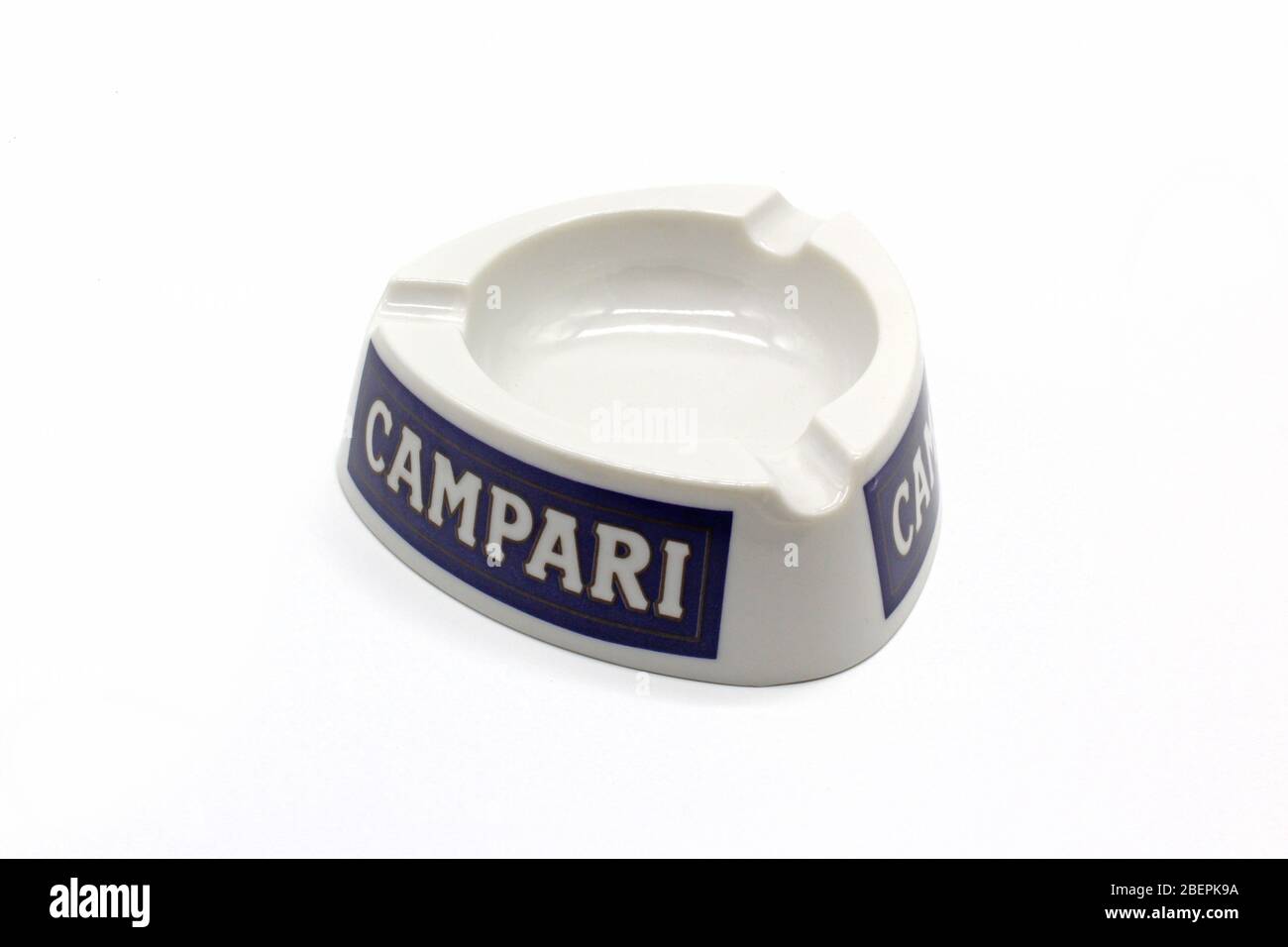 Empty plastic ashtray with logo of Campari, isolated on a white background Stock Photo