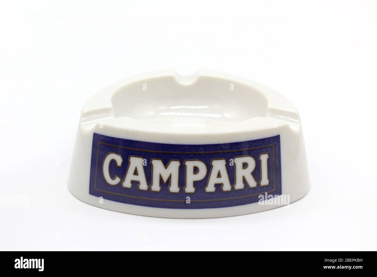Vintage ashtray with logo of Campari, isolated on a white background, close up Stock Photo