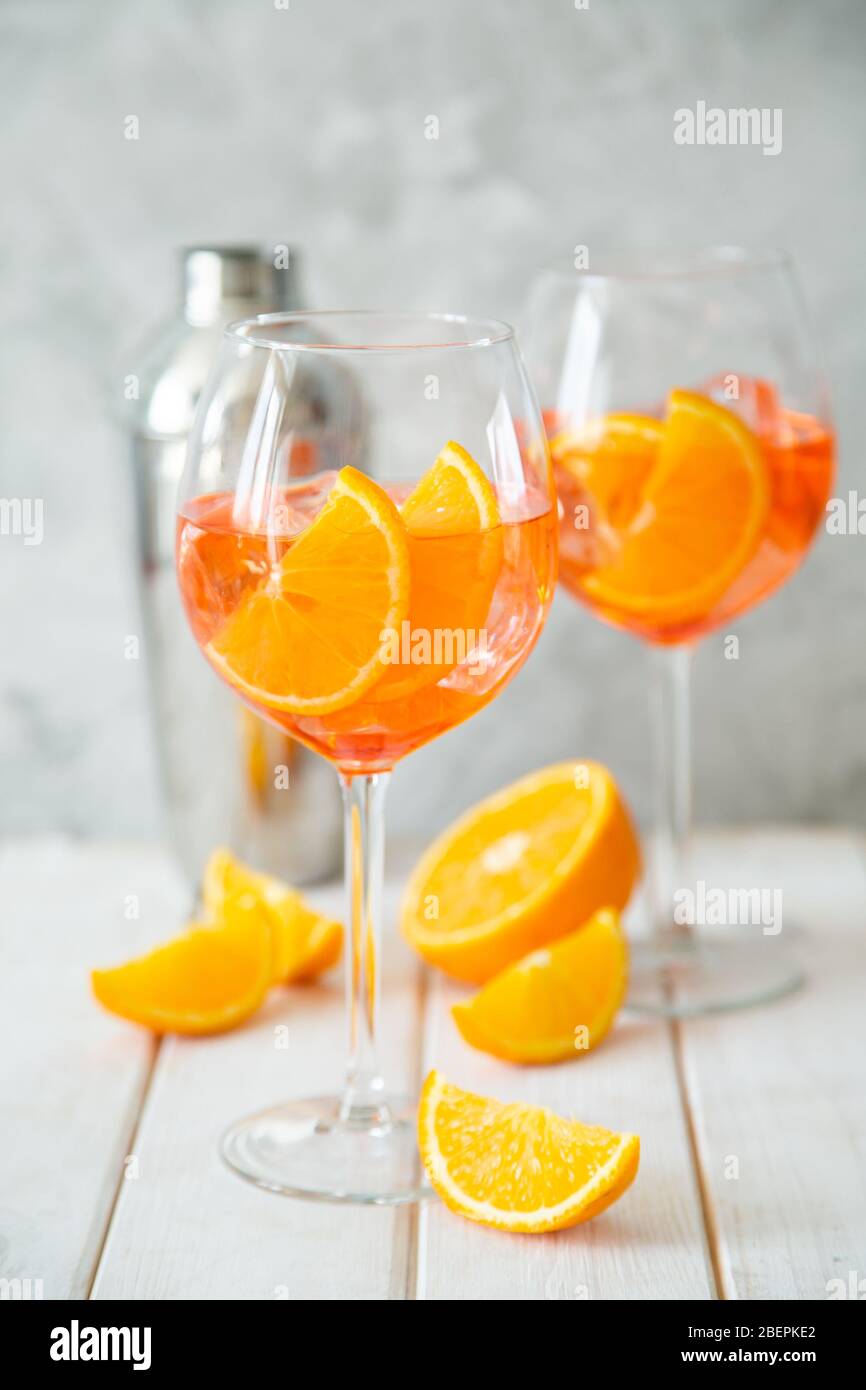 Aperol and ingredients drinks on wood background Stock Photo