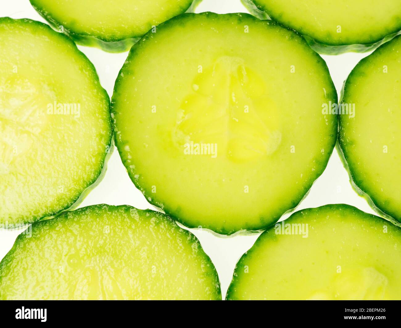 Cucumber slices from above on a white background Stock Photo