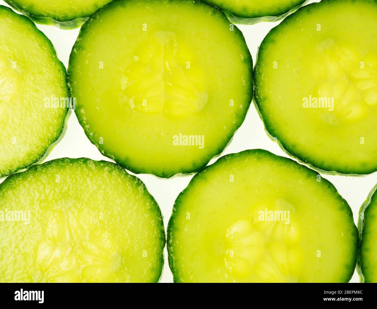Cucumber slices from above on a white background Stock Photo