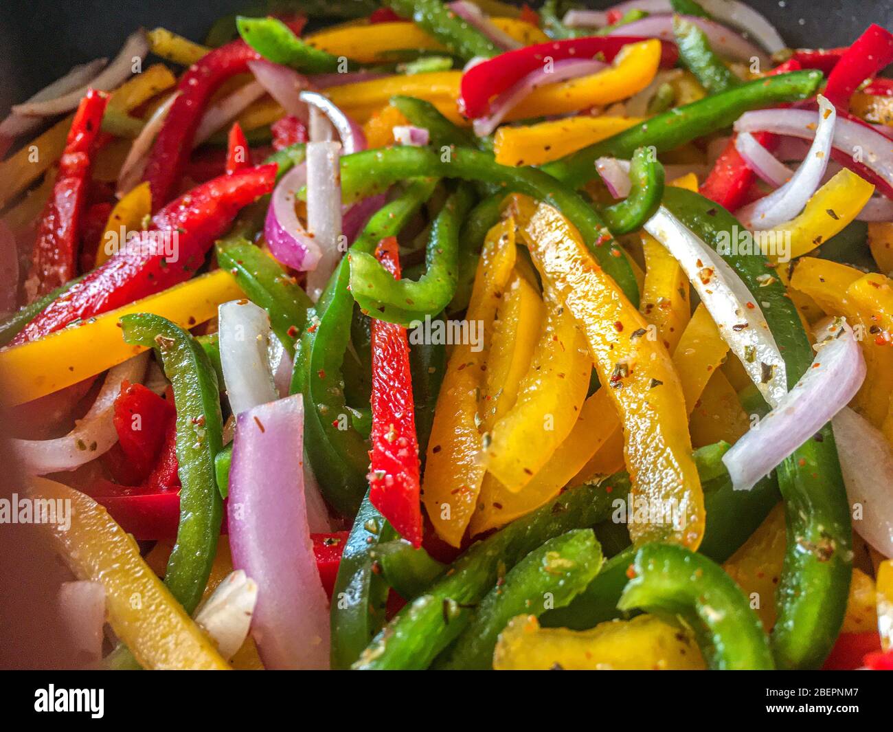 sliced bell peppers and onion Stock Photo