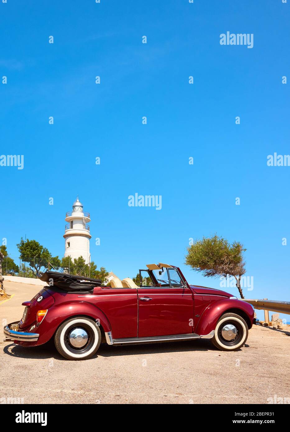 Mallorca, Spain - August 20, 2018: Volkswagen Beetle Cabriolet 1303 parked by Cap Gros lighthouse. Stock Photo