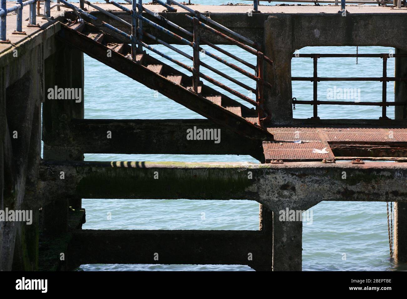 Victoria Pier, an old jetty by the Hot Walls, Portsmouth Harbour entrance, Hampshire, England, UK Stock Photo