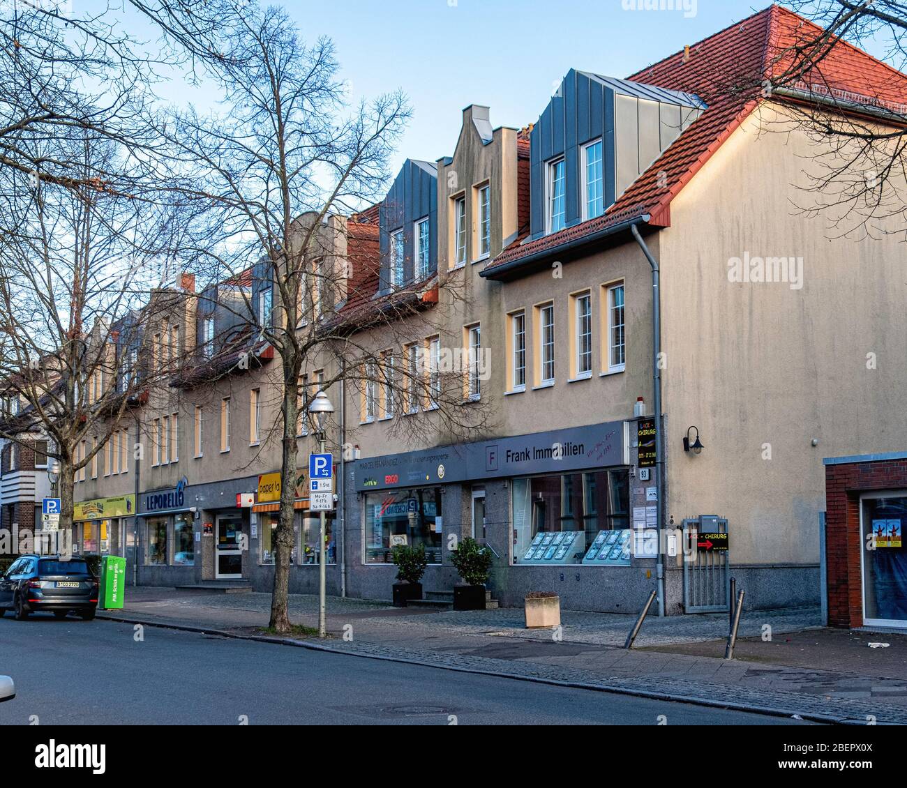 Krokusstrasse street view.  Frank Immobilien, DKW Insurance, Paperlapapp and Leporello shops - Rudow-Berlin, Neukölln, Germany Stock Photo