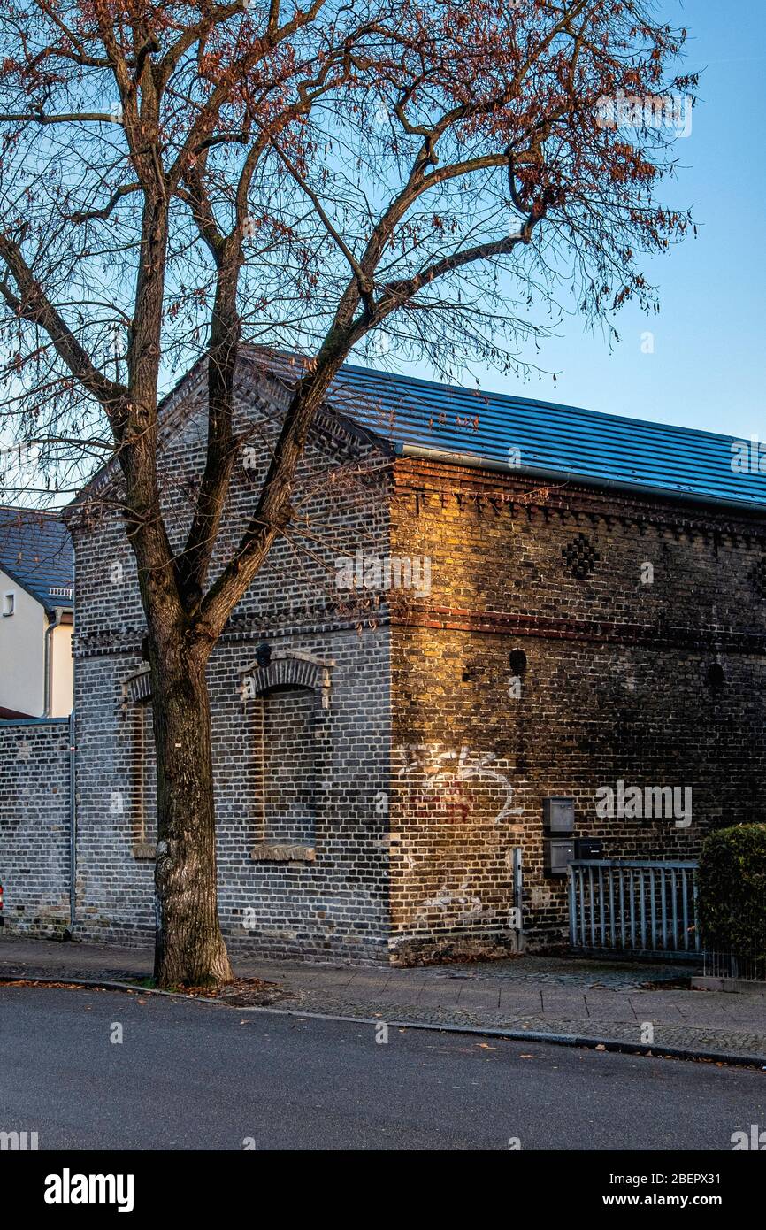 Old brick building exterior & facade, Krokusstrasse 83, Rudow-Berlin, Neukölln, Germany Stock Photo