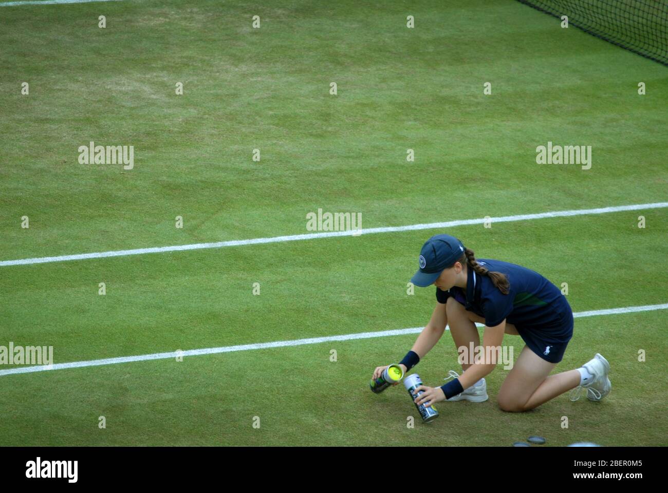 Ball Girls, Mario Ancic and Wayne Black playing Gentlemens’s doubles against Xavier Malisse and Max Mirnyi, 2019 Wimbledon Championships, London, GB. Stock Photo