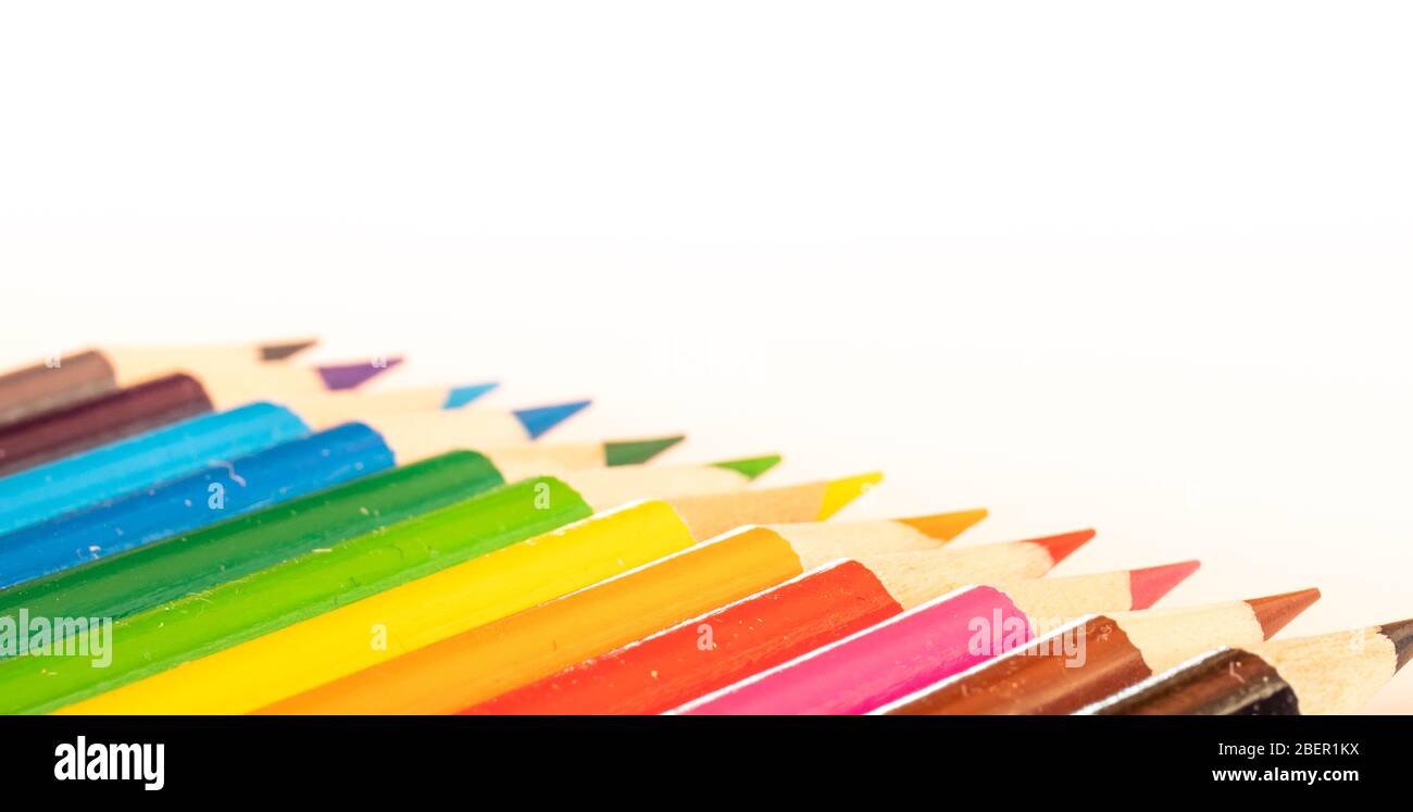 assorted colored pencils used for drawing and coloring on a white background Stock Photo Alamy