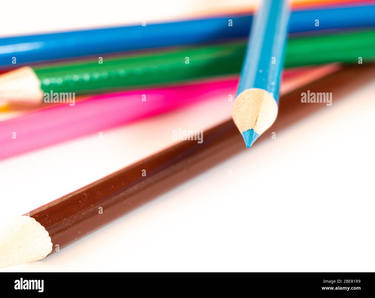 assorted colored pencils used for drawing and coloring on a white background Stock Photo Alamy