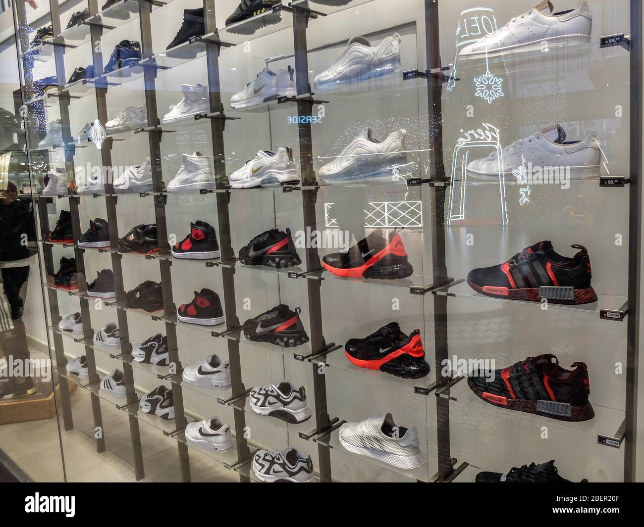 Black and white Nike sneakers in a display window Stock Photo - Alamy