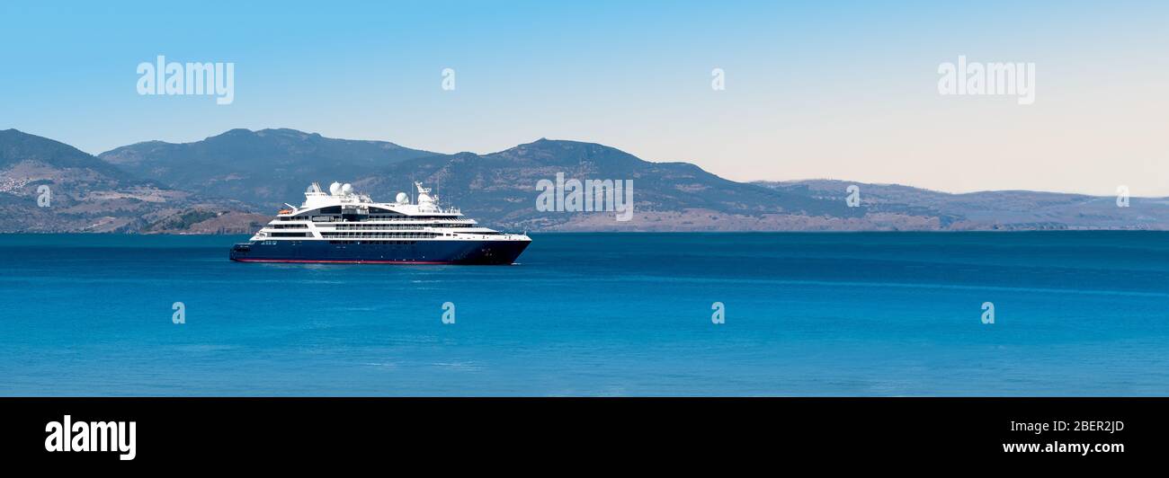 Side view of small cruise ship on the Aegean Sea. Panorama. Stock Photo