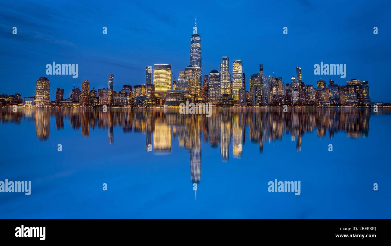 New York and New Jersey skyline from new jersey deck at sunset blue