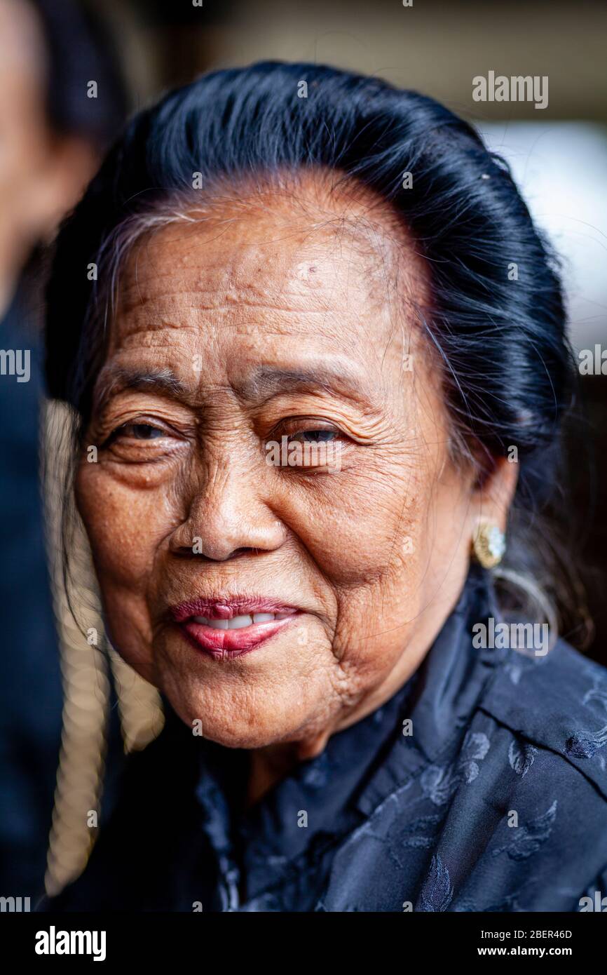 A Portrait Of A Gamelin (Traditional Indonesian Orchestre) Performer At A Traditional Javanese Dance Show, The Sultan’s Palace, Yogyakarta, Indonesia. Stock Photo