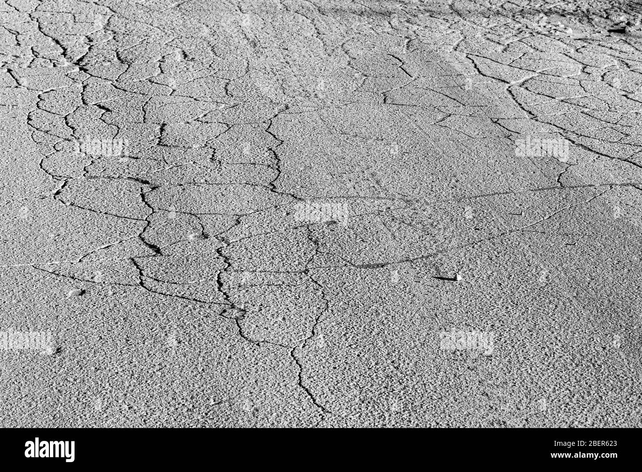 Holes and puddles on damage road way asphalt after winter season. Dirty ...