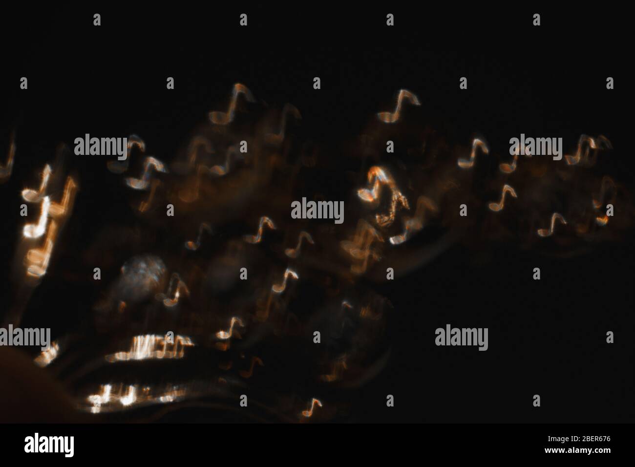 Gold notes on black background Stock Photo