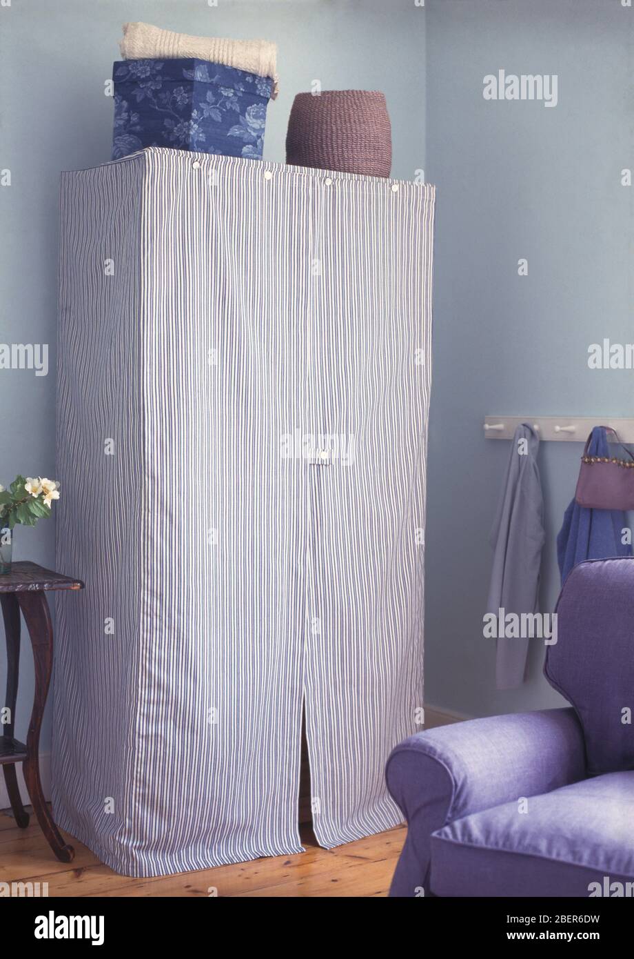 Temporary wardrobe with cloth cover Stock Photo Alamy