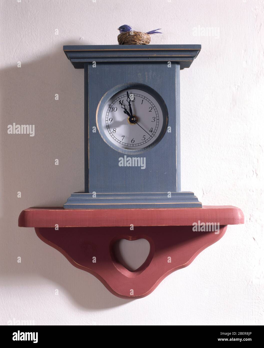 Modern cuckoo clock on wall shelf Stock Photo Alamy