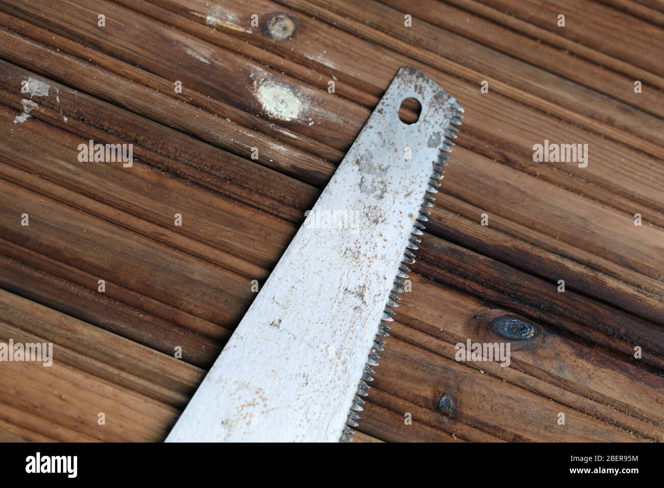 DIY building a porch / balcony floor with brown wooden planks in Espoo