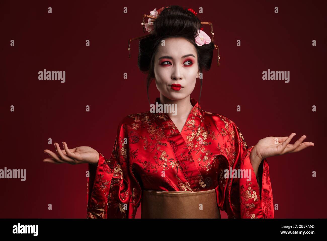 Image Of Attractive Asian Geisha Woman In Traditional Japanese Kimono Hesitating Isolated Over