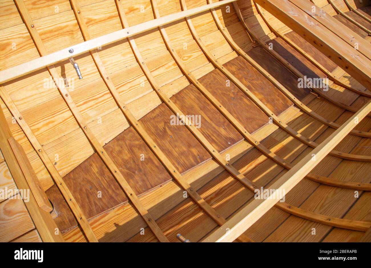 The structure of a wooden rowboat / skiff inside bottom and hull