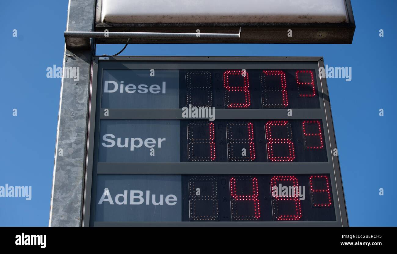 Hamburg, Germany. 15th Apr, 2020. The advertisement of a petrol station  shows a diesel price of 0.979 Euro per litre. The super gasoline costs  1.169. AdBlue (urea solution) is offered for 0.499