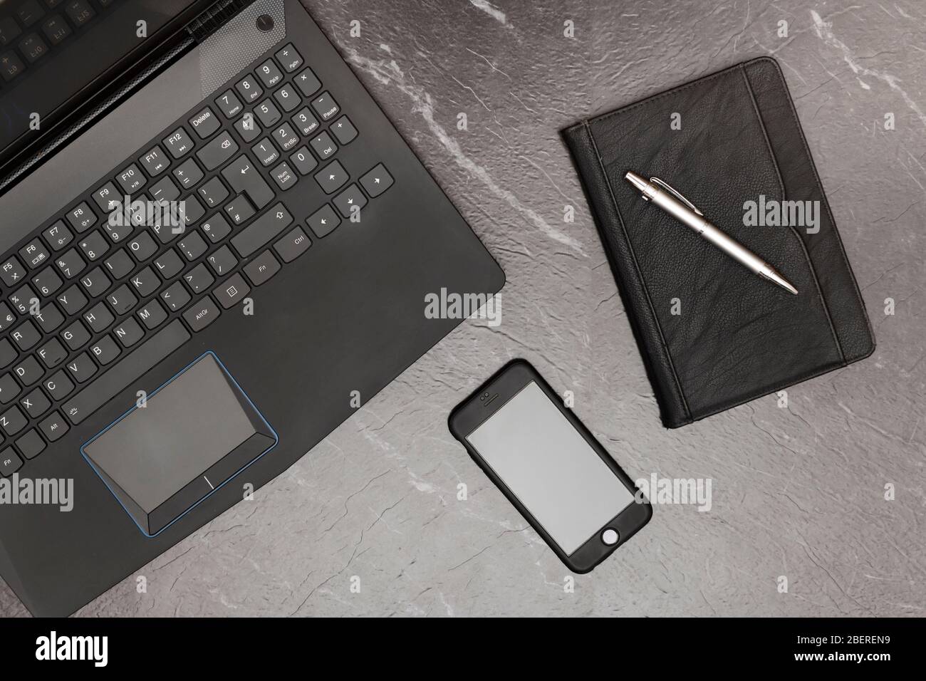 Home workspace with blank smartphone screen Stock Photo