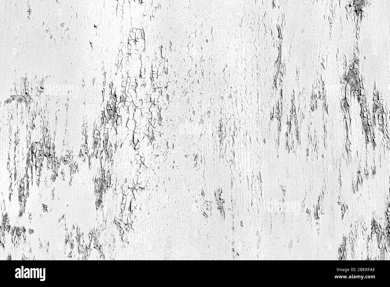Texture of peeling paint from rusty metal. Abstract background for design. Black and white Stock