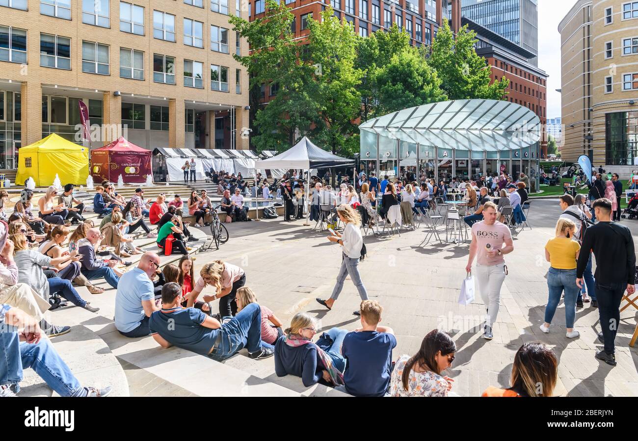 A busy and crowded Brindleyplace in Birmingham City Centre during a summer food and drink festival Stock Photo