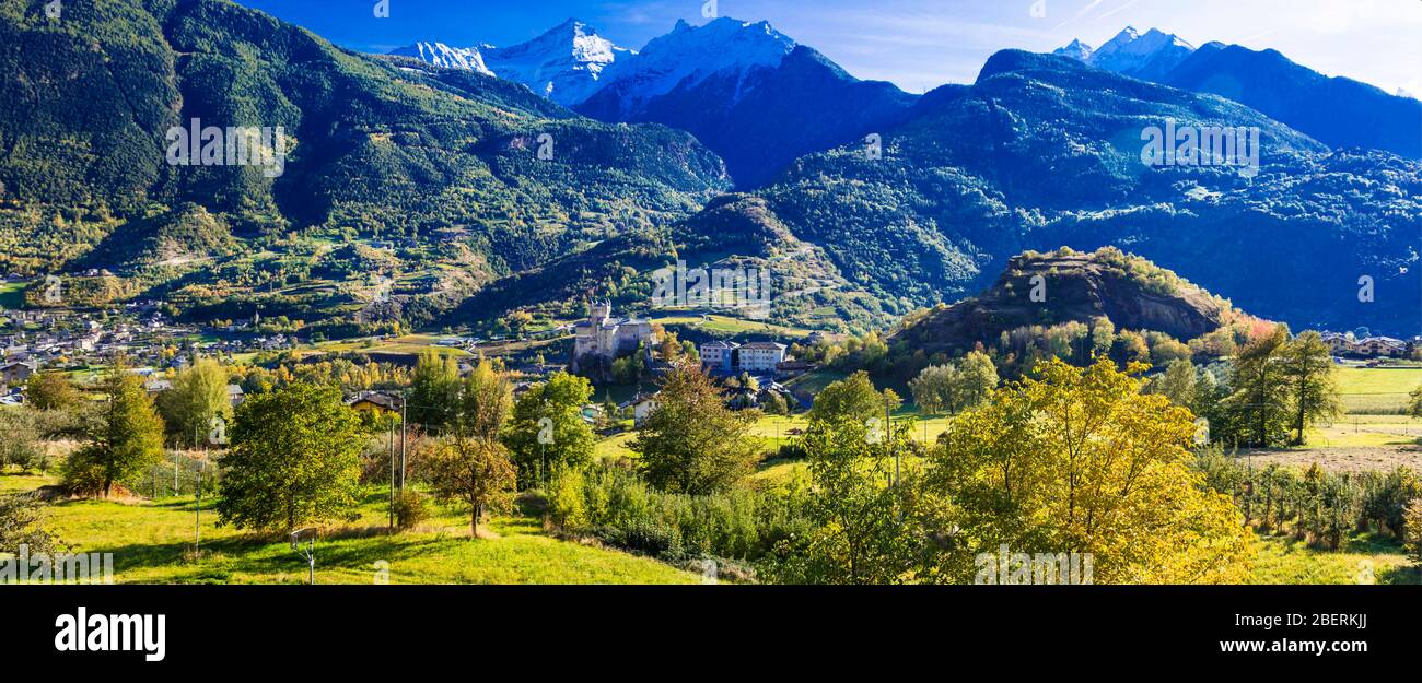 Impressive mountains and Saint Pierre castle in Valle d’Aosta region,Italy. Stock Photo