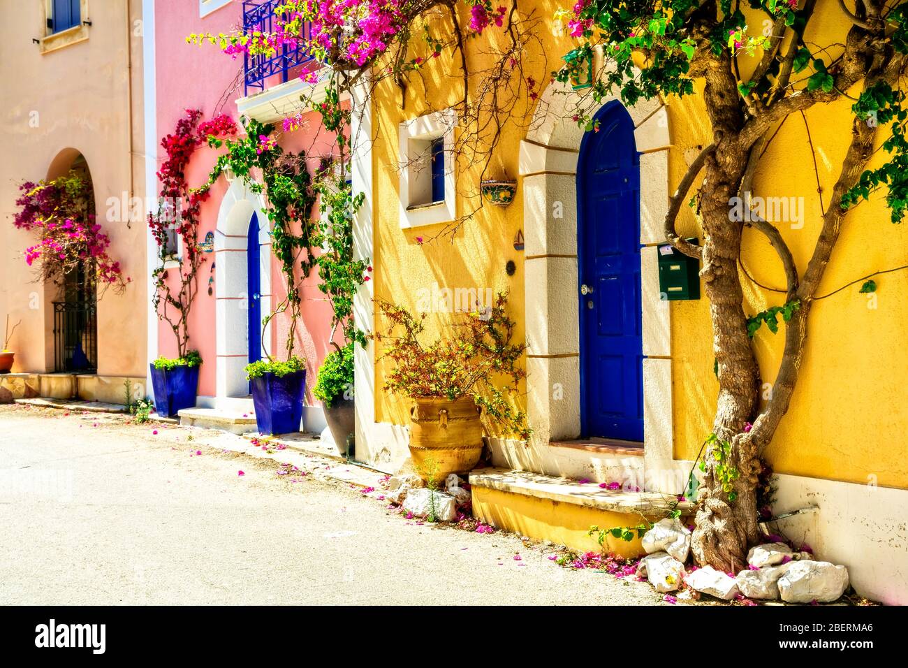 Colrful house,doors and flowers in Assos village,Cefalonia island,Greece. Stock Photo