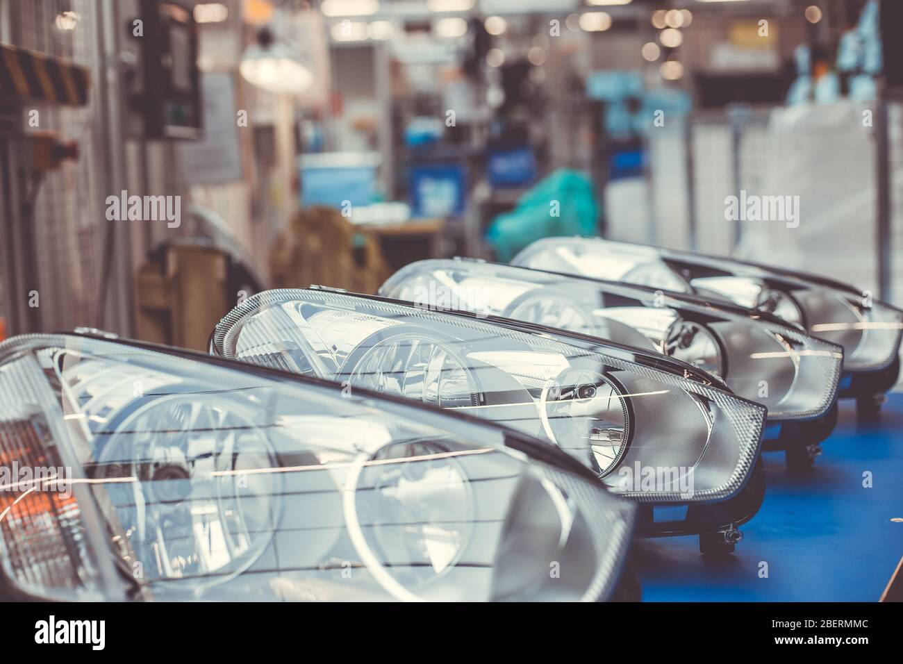 Close up of car headlamps, headlights in a row ready for assembly to the car, automotive industry concept Stock Photo