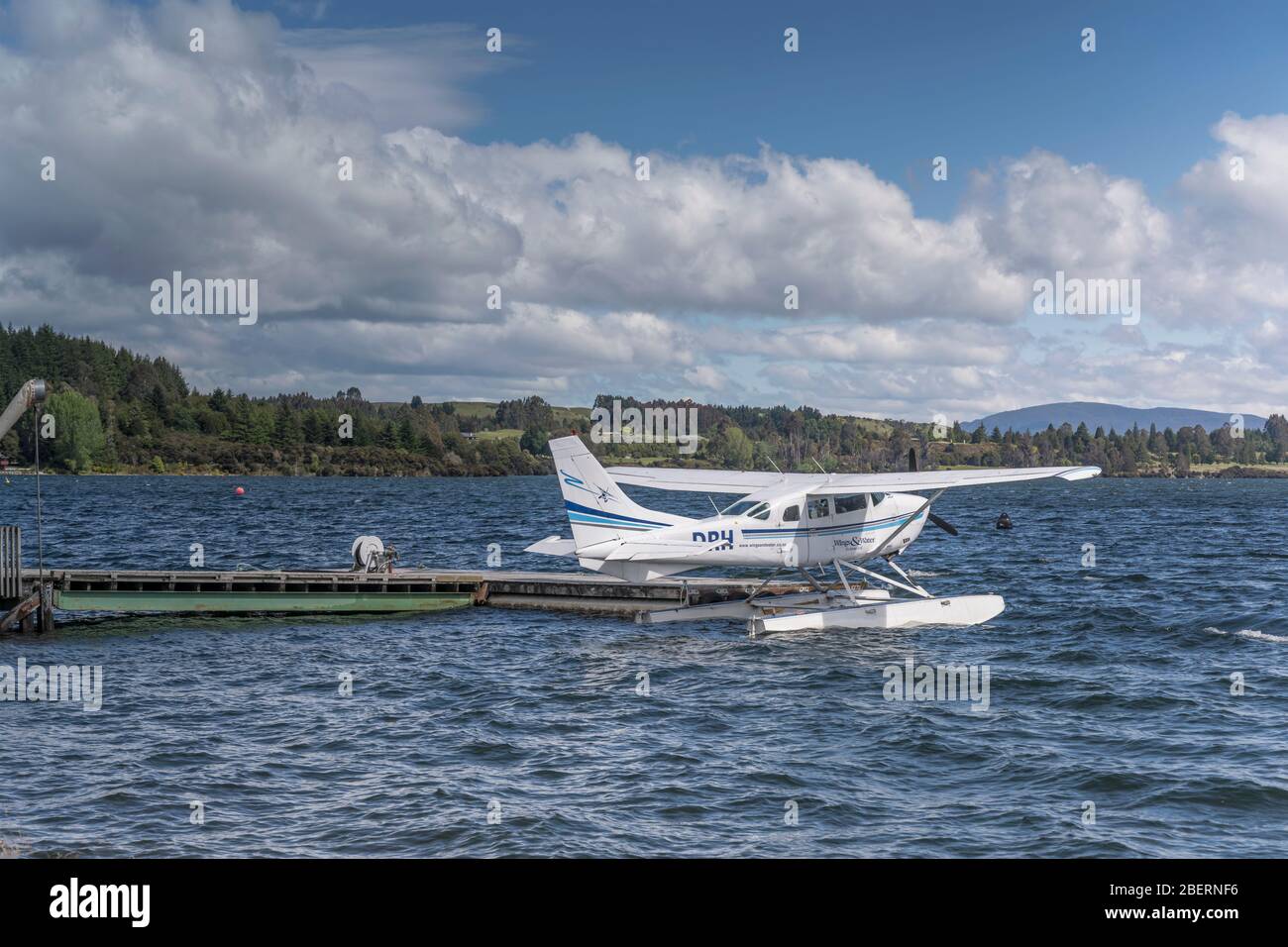 TE ANAU, NEW ZEALAND - November 20 2019: seaplane floats on lake shore at touristic village, shot in bright late spring light on november 20 2019 at T Stock Photo