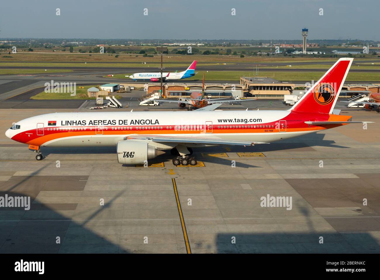 TAAG Angola Airlines Boeing 777 airplane taxiing at OR Tambo Airport in Johannesburg. Angolan aircraft registered as D2-TEE. Stock Photo