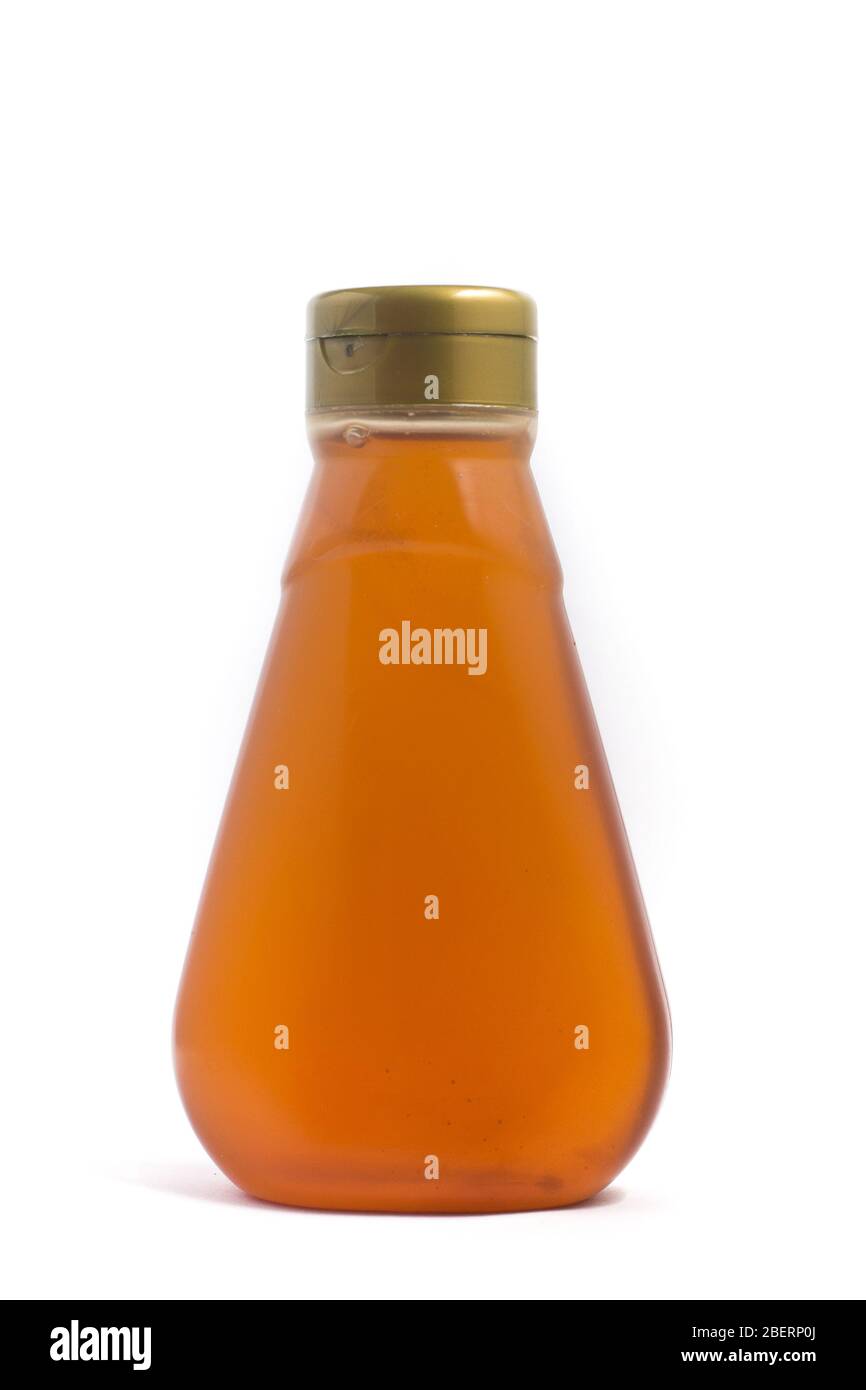 Honey in a Jar. Plastic Package isolated on white background Stock
