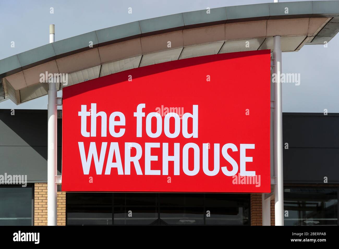The food warehouse, company logo, above a shopping outlet selling groceries and home goods, Kilmarnock, Scotland Stock Photo