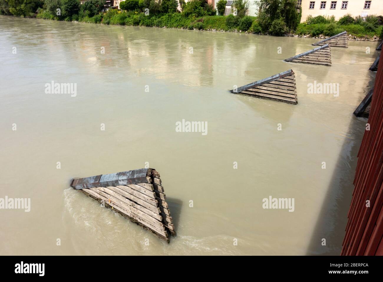 River defense breakwaters upstream of the River Inn Bridge, Wasserburg, Bavaria, Germany. Stock Photo