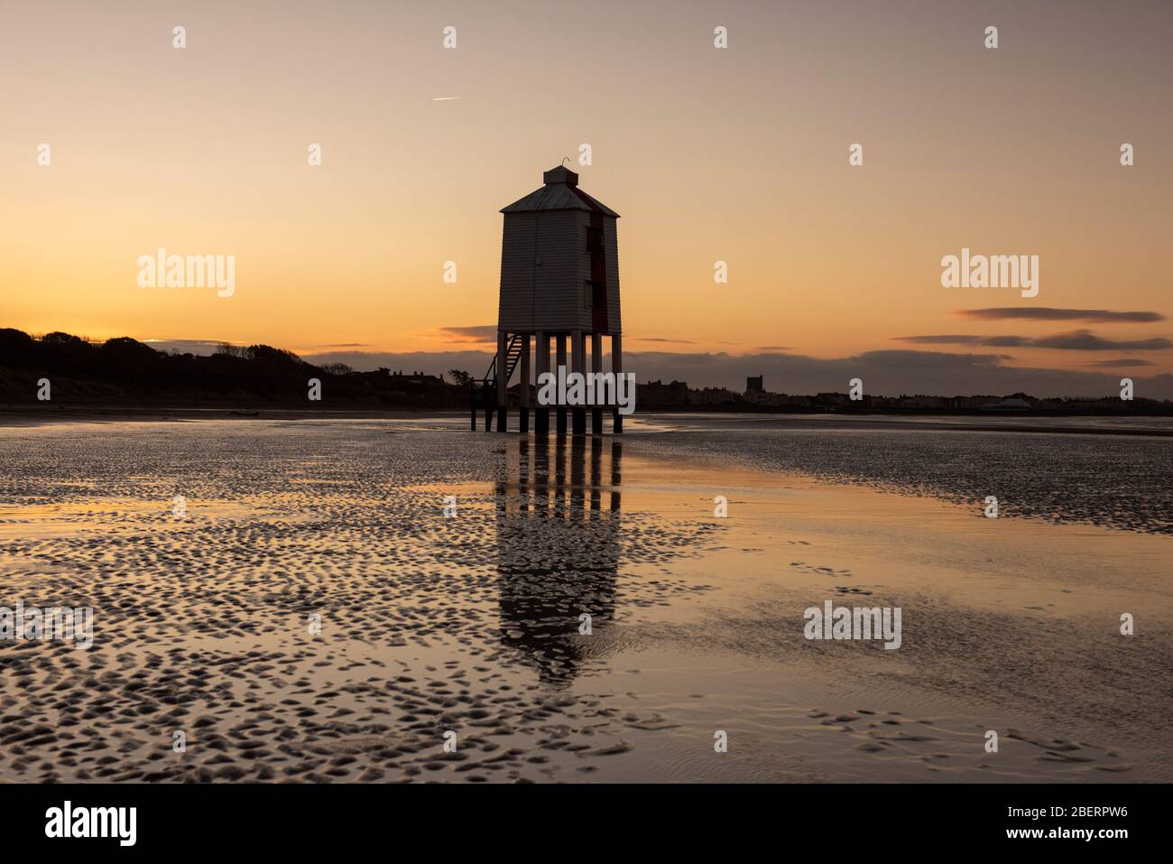 Sunrise at the Low Lighthouse during low tide, Burnham on Sea Somerset England UK Stock Photo