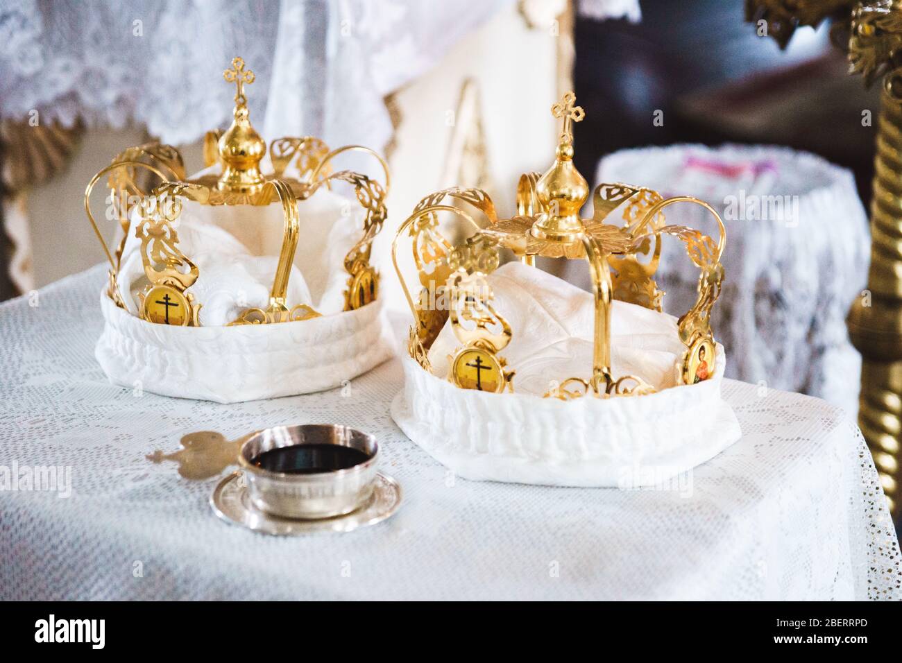 Wedding crowns in the orthodox church on the white Stock Photo - Alamy