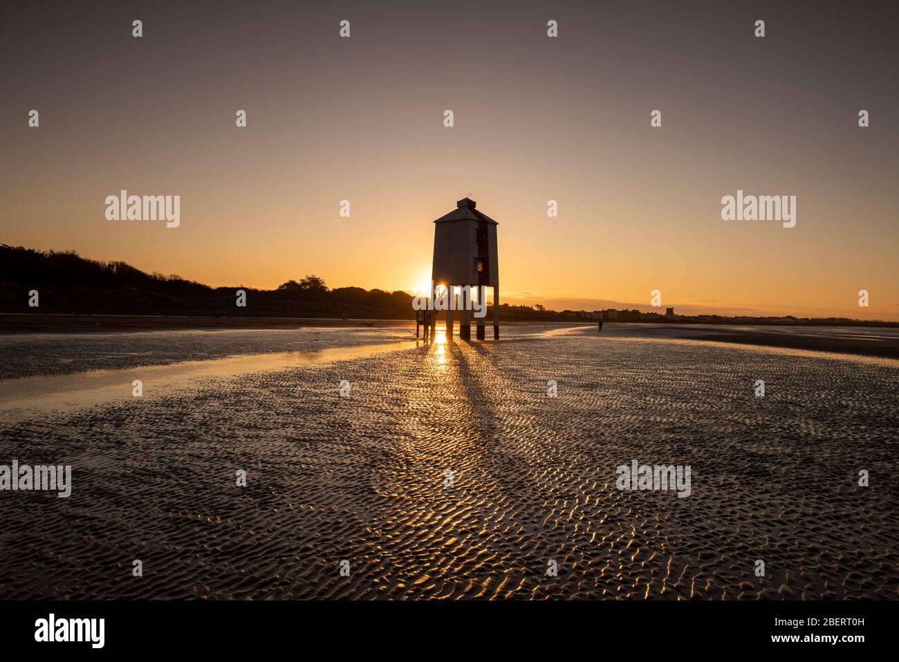 Sunrise at the Low Lighthouse during low tide, Burnham on Sea Somerset England UK Stock Photo