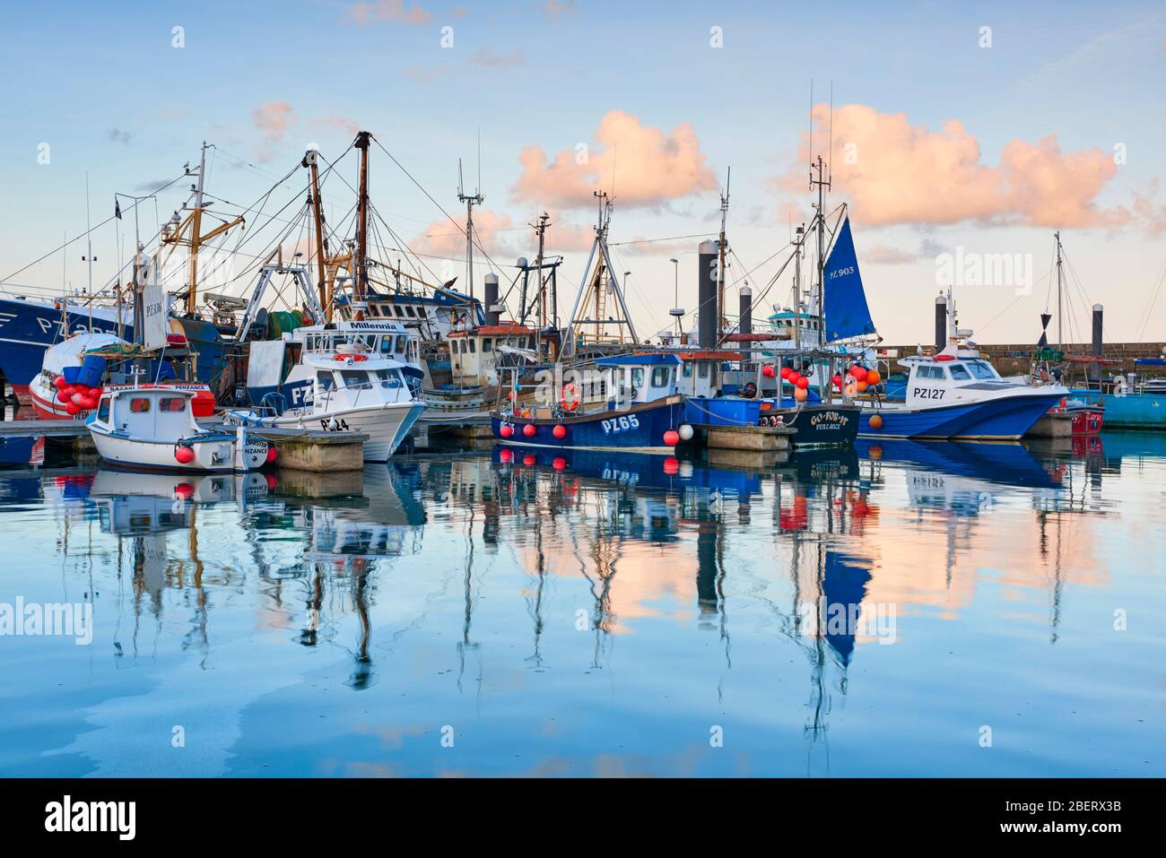Calm evening overlooking the fishing boats at Newlyn Harbour Stock Photo