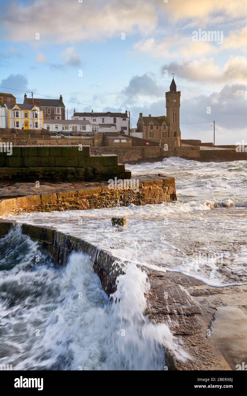 Stormy sea breaching over the harbour wall at Porthleven Stock Photo