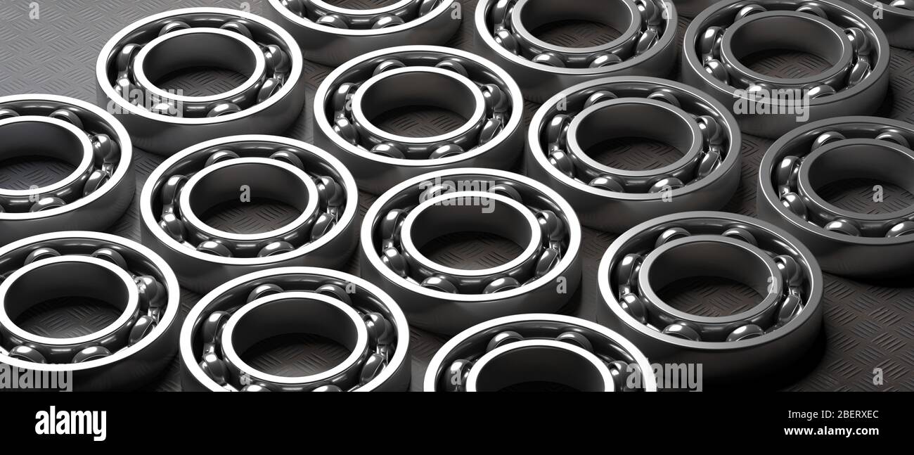 Ball bearings. Steel spare parts on industrial black metal sheet background. Machinery, engine mechanism, engineering concept. 3d illustration Stock Photo